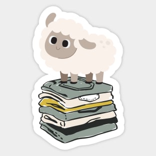 Cute Baby Sheep on top of folded clothes Sticker